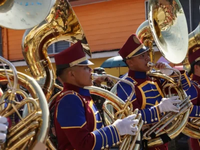 marching band players playing tuba instruments